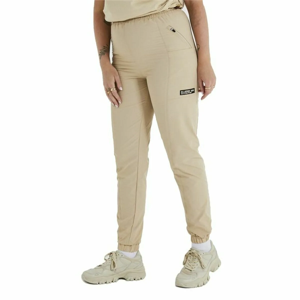 PANTALÓN LARGO DEPORTIVO ELLESSE AVELLA BEIGE MUJER